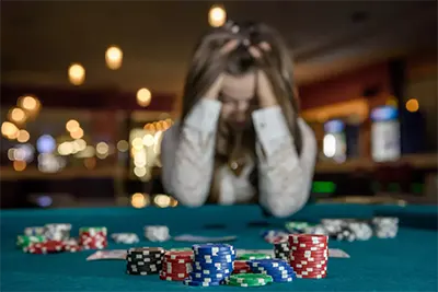Understanding Gambling Addiction: Key Signs, Origins, and Treatment Methods